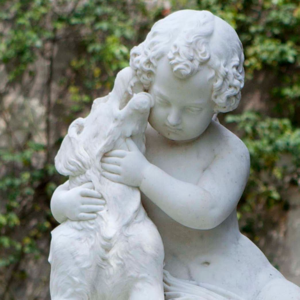 Sculpture child dog romantic park montresor